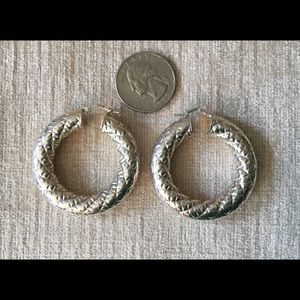 Vintage sterling  hoop signed by artist earrings